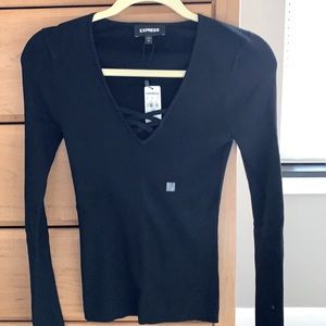 Express long sleeve knit top.